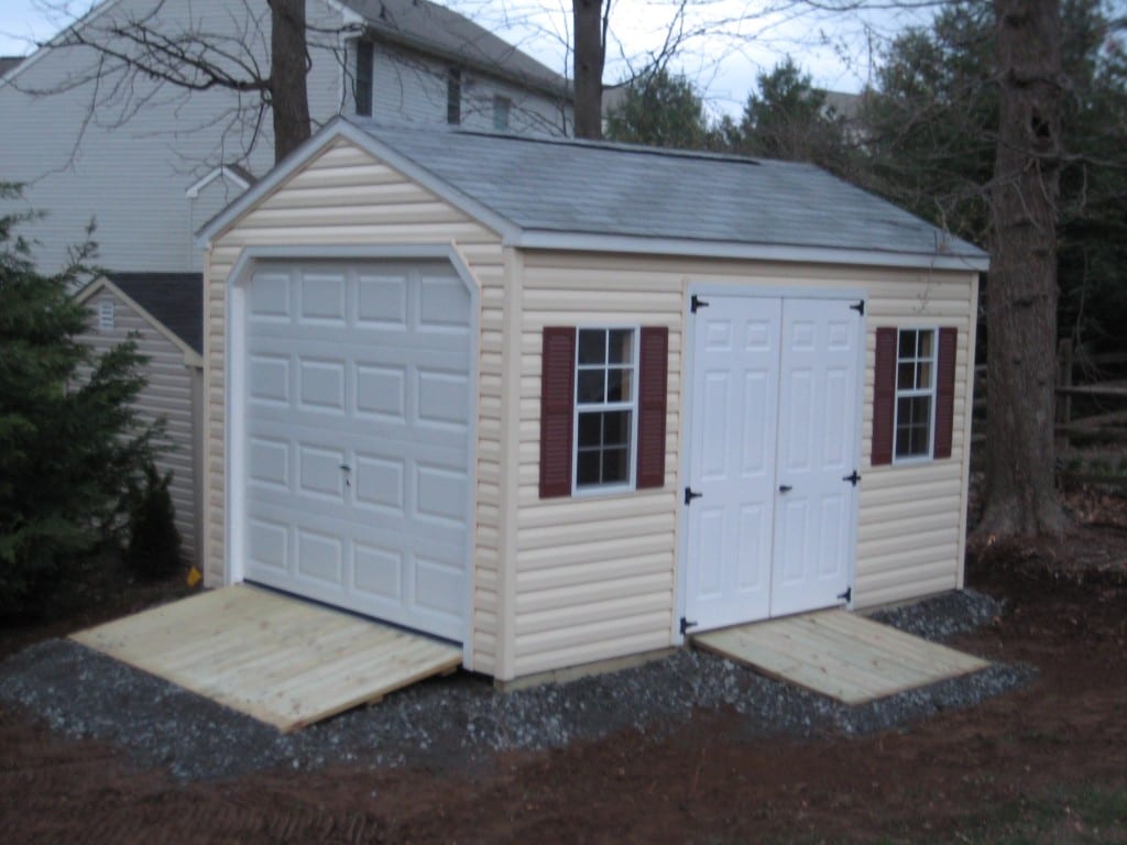  Storage Shed with Garage Door with ramp and gravel site preparation
